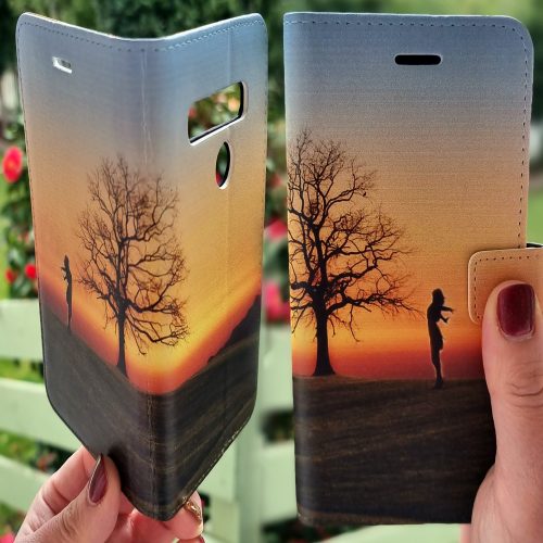 Flip Wallet Mobile Phone Cover featuring Sunset Silhouette of Girl Stretching on the Field